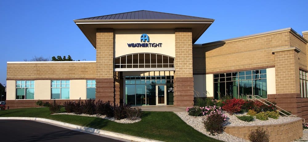 Image shows the exterior of Weather Tight's headquarters building in West Allis, WI.