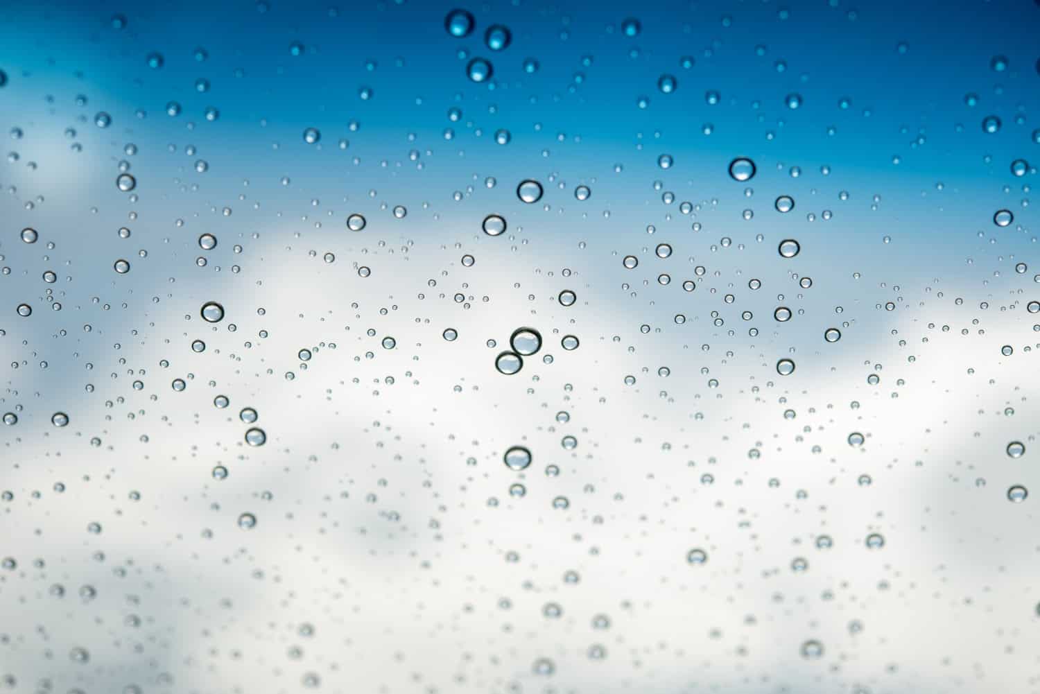 A closeup image of water droplets on a window.