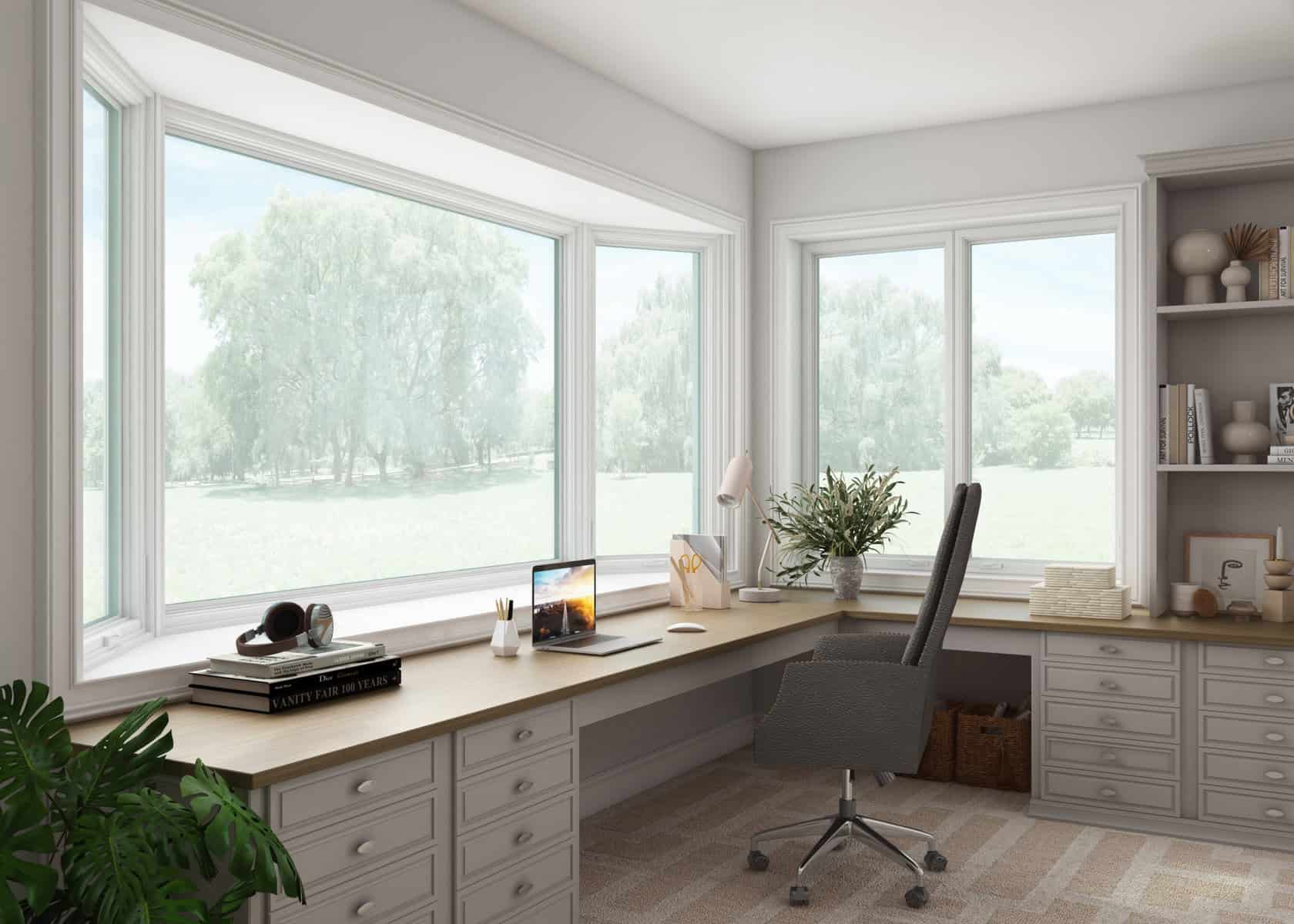 Image shows a large picture window in the interior of a home office. White walls, trim, and cabinetry are accented by a wood desk. 